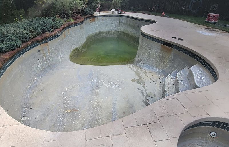 Restored swimming pool crystal blue water