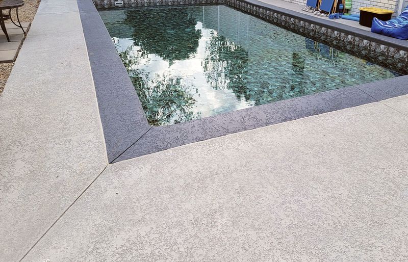 Pool coping installation around gunite pool