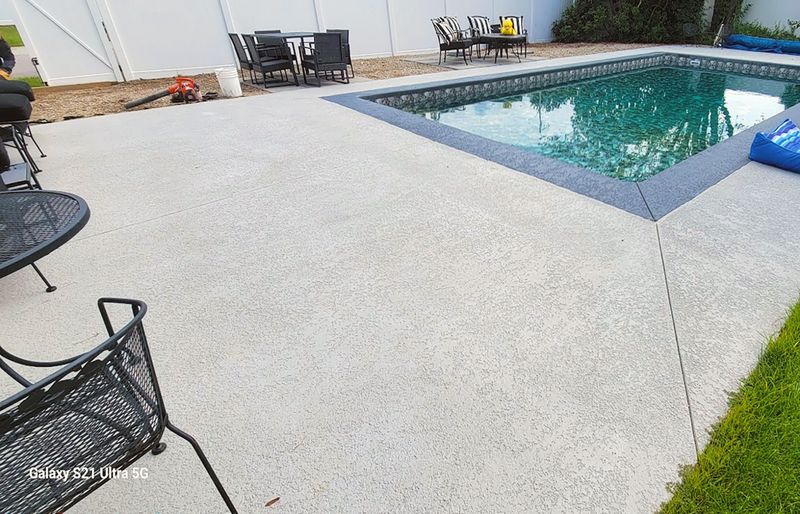 Pool coping reset and re-bonded with pool-grade sealant
