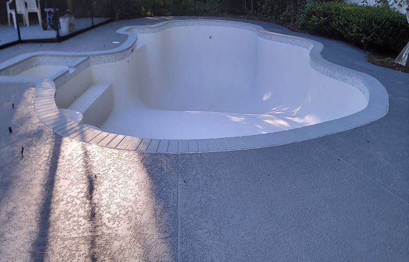 Pool deck renovation with textured concrete coating