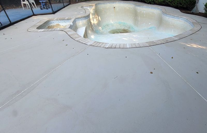 Concrete pool deck restoration polymer concrete overlay