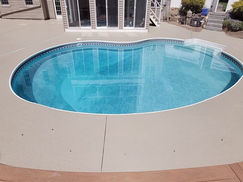 Pool deck stamped concrete renovation New England