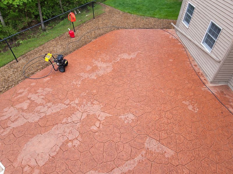 Stamped concrete overlay pool area Massachusetts