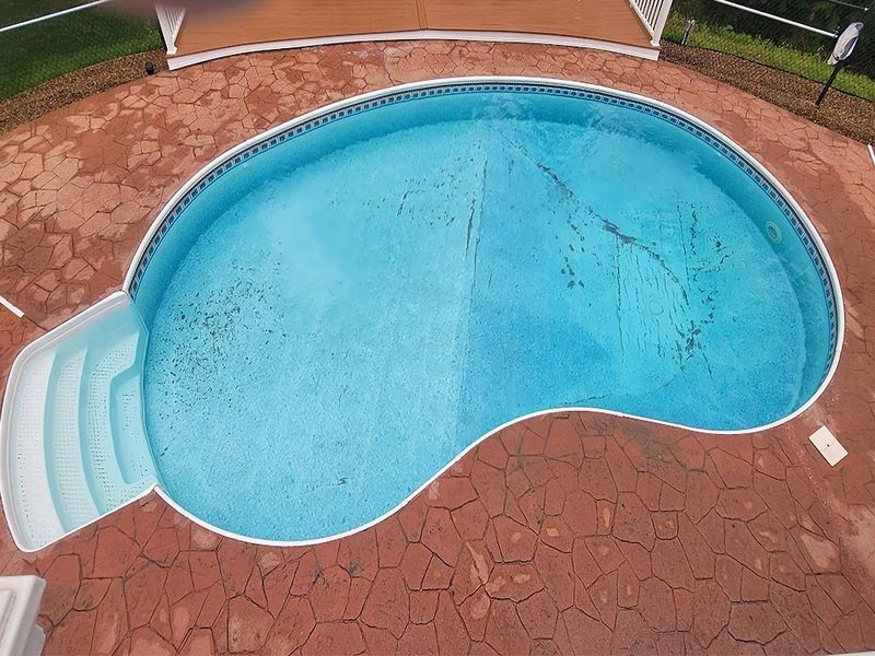 Stamped concrete pool deck completed project