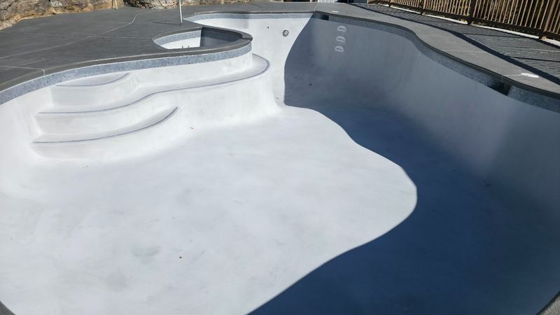 Replastered swimming pool with spa
