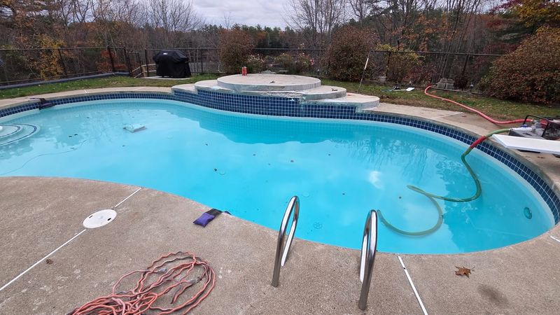 Pool deck extension with concrete overlay
