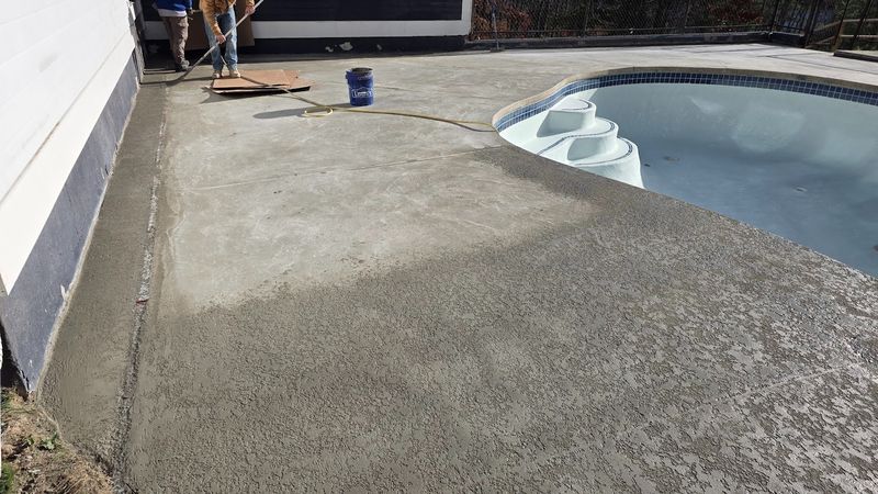 Concrete deck extension around swimming pool