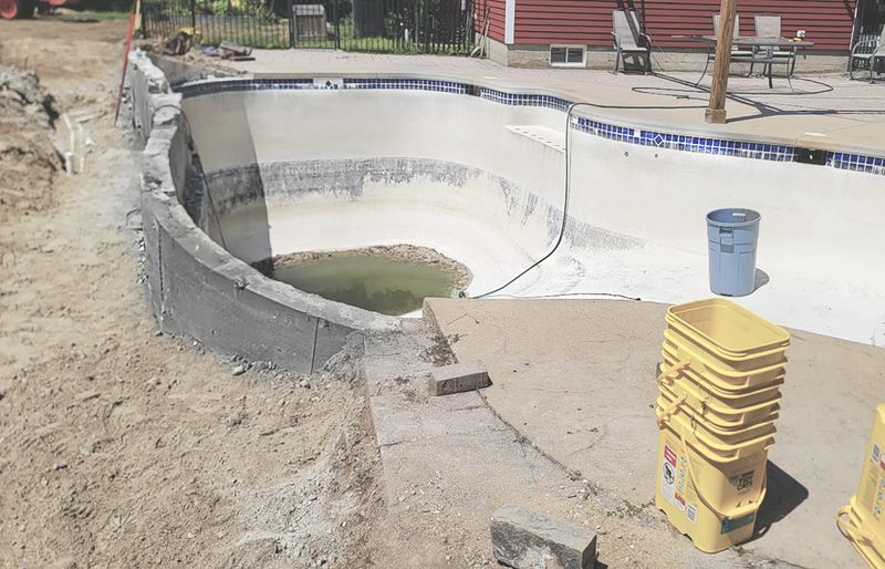 Pool deck extension with new concrete pour