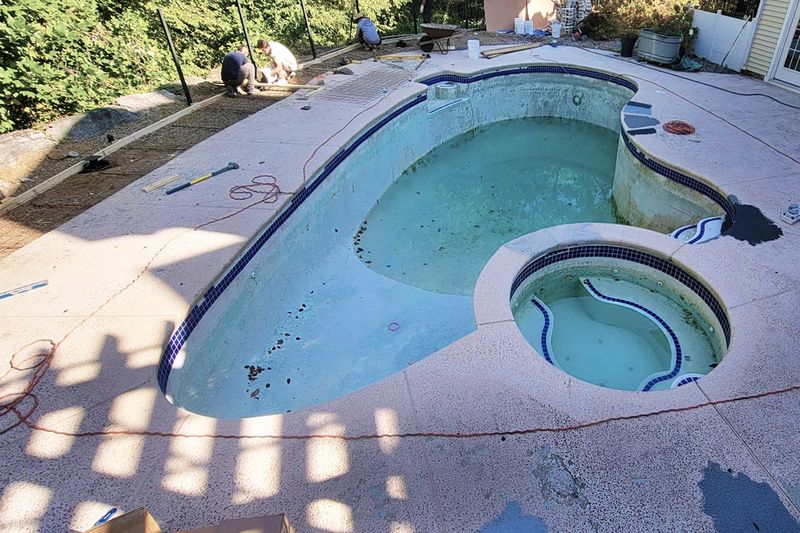 Swimming pool renovation project 26 deck and plaster