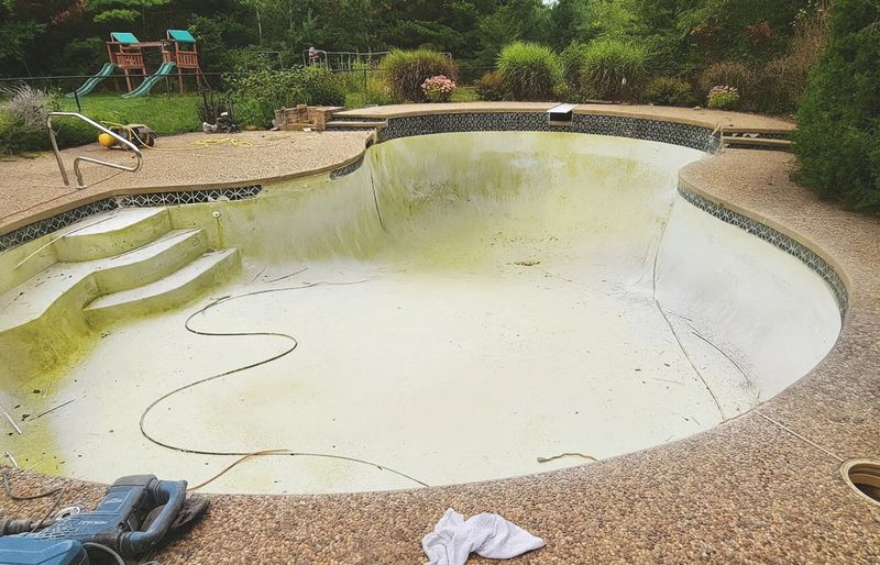 Swimming pool renovation project 23 tile and coping