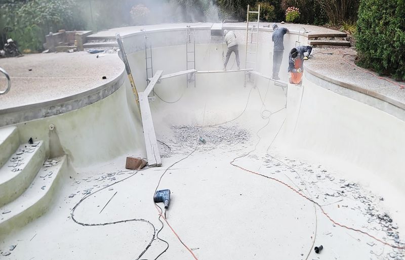 Pool renovation project 24 polymer concrete overlay