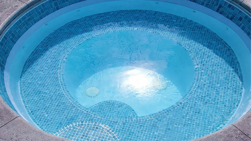 Swimming pool mosaic tile restoration