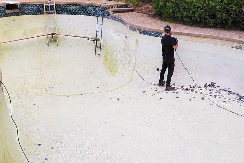 Glass mosaic tile installation pool waterline