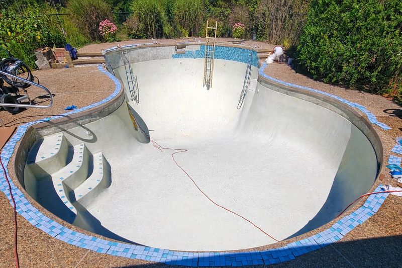 Mosaic waterline tile installation Total Design Concrete