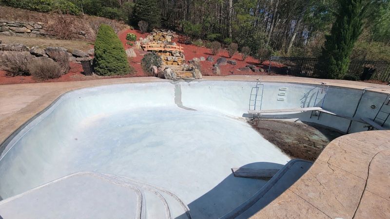 Waterline tile installation on gunite pool New England