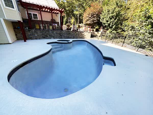 Completed hilltop pool renovation with spa